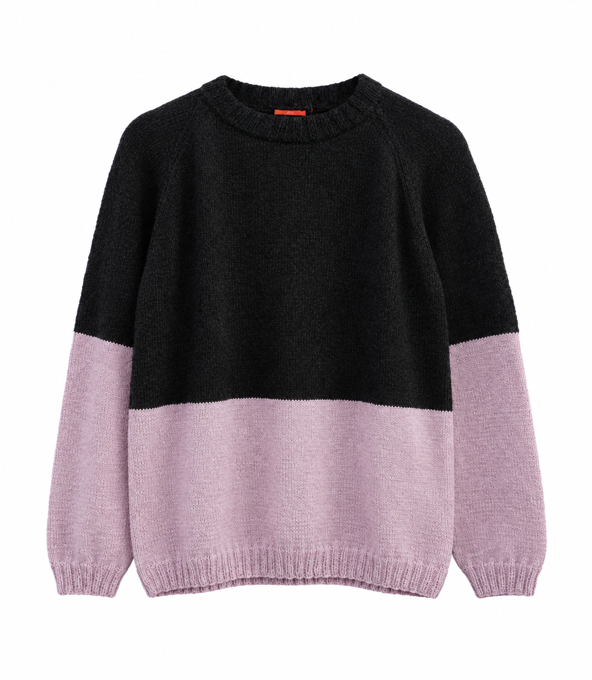 A colorblock knit sweater with a black upper body and light pink lower body and sleeves, shown against a plain white background.
