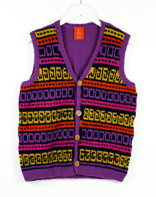 Sleeveless dark pink coloured cardigan with yellowish patterns on it