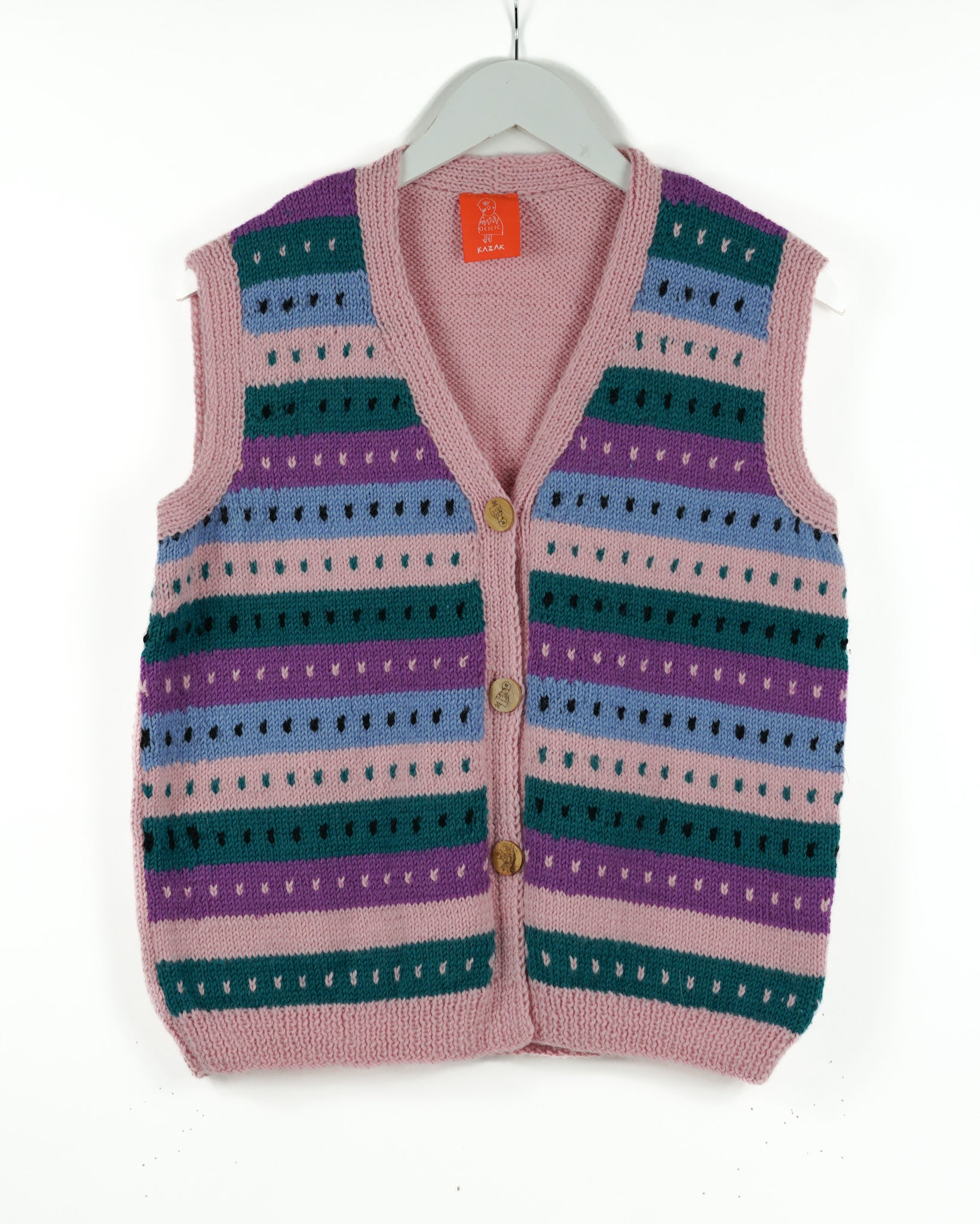 Striped knitted light pink vest on a hanger with a white background