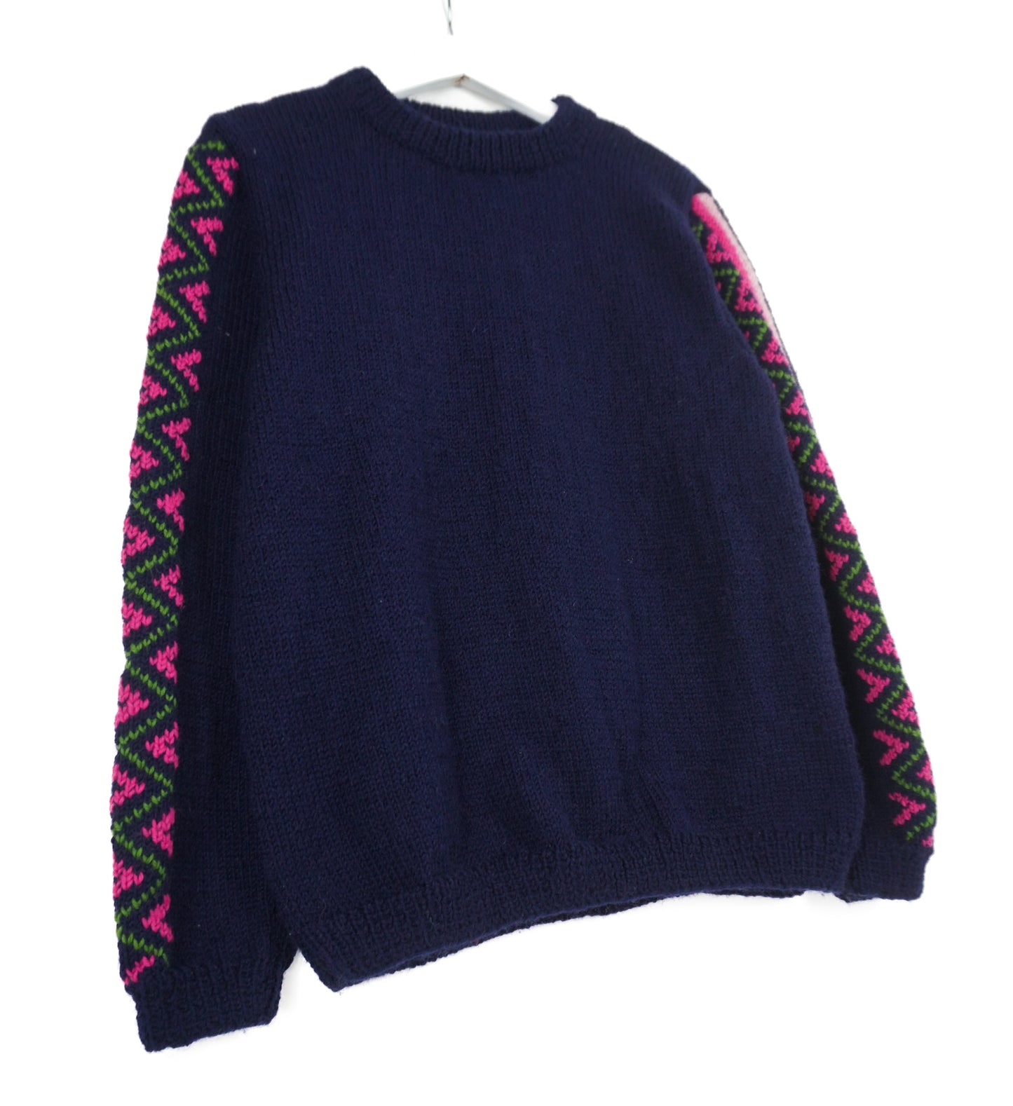 Navy Blue jumper with heritage patterns on its sleeves
