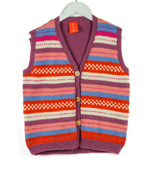 Striped  and checkered knitted vest with colourful pattern on a white background