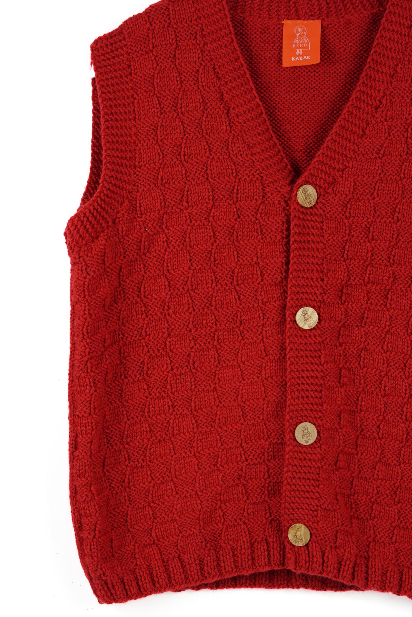 Red sleeveless cardigan with yellow buttons on a white background