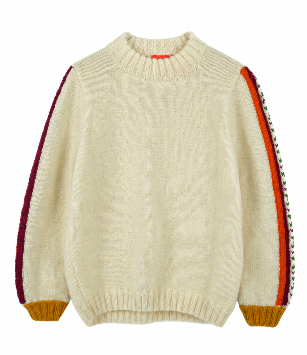 An off-white knit sweater with colorful striped sleeve panels in red, orange, green, and yellow, set against a plain white background.