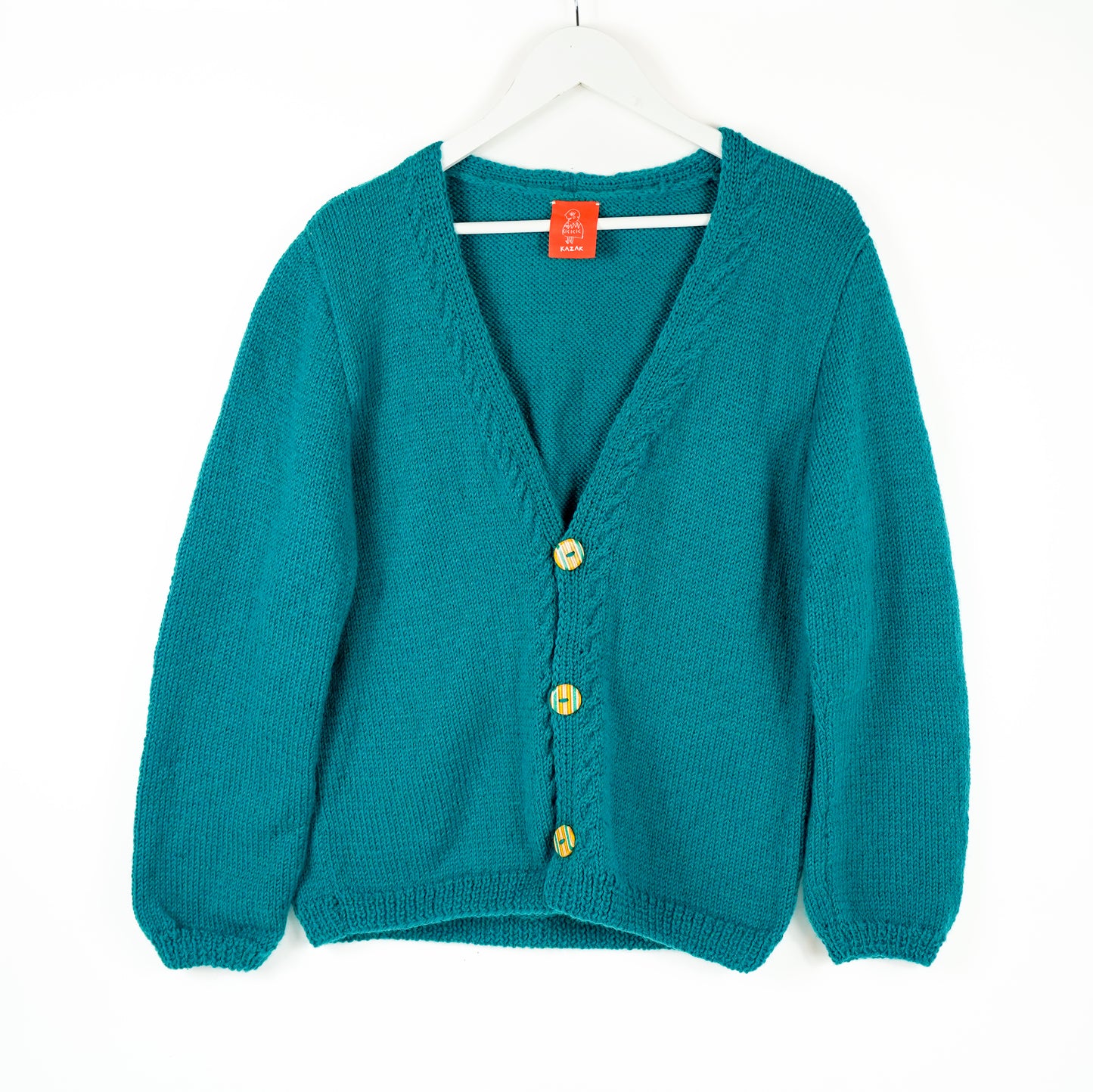 Green hand knitted pure wool cardigan, solid colour, one off cardigan, Handmade buttons from recycled skateboards