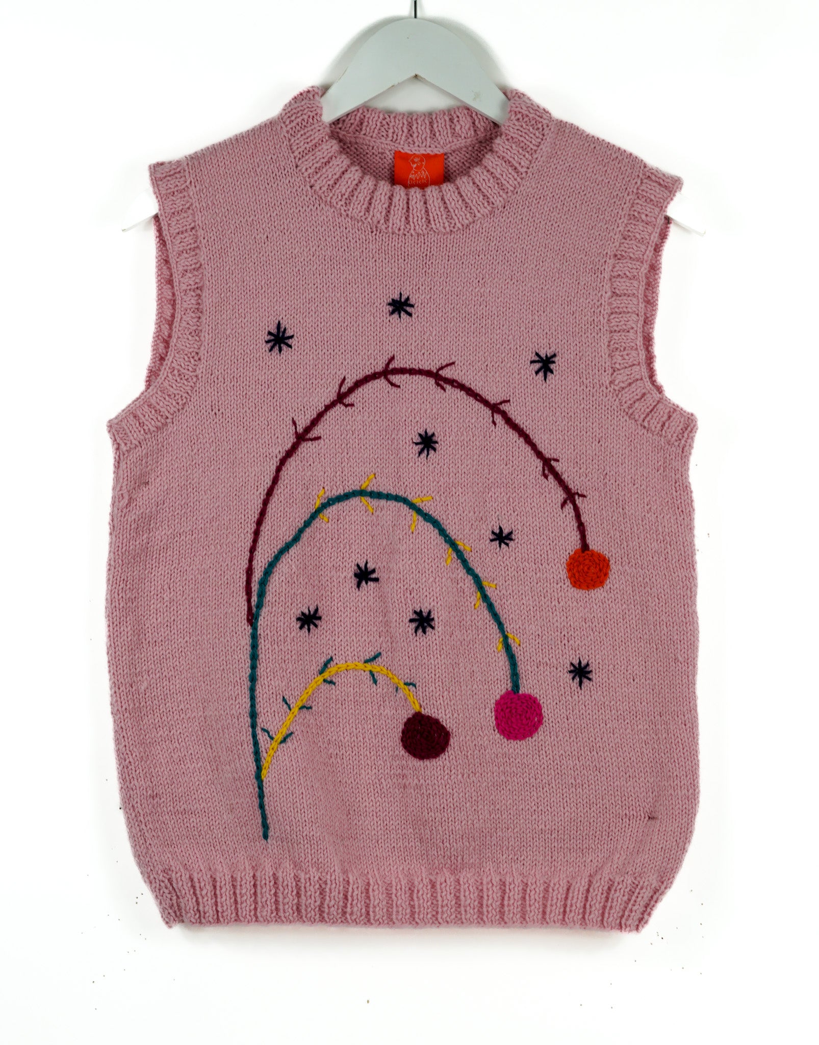 Pink pure wool vest with floral dressing on it, this is a hand knitted one off vest, tank top