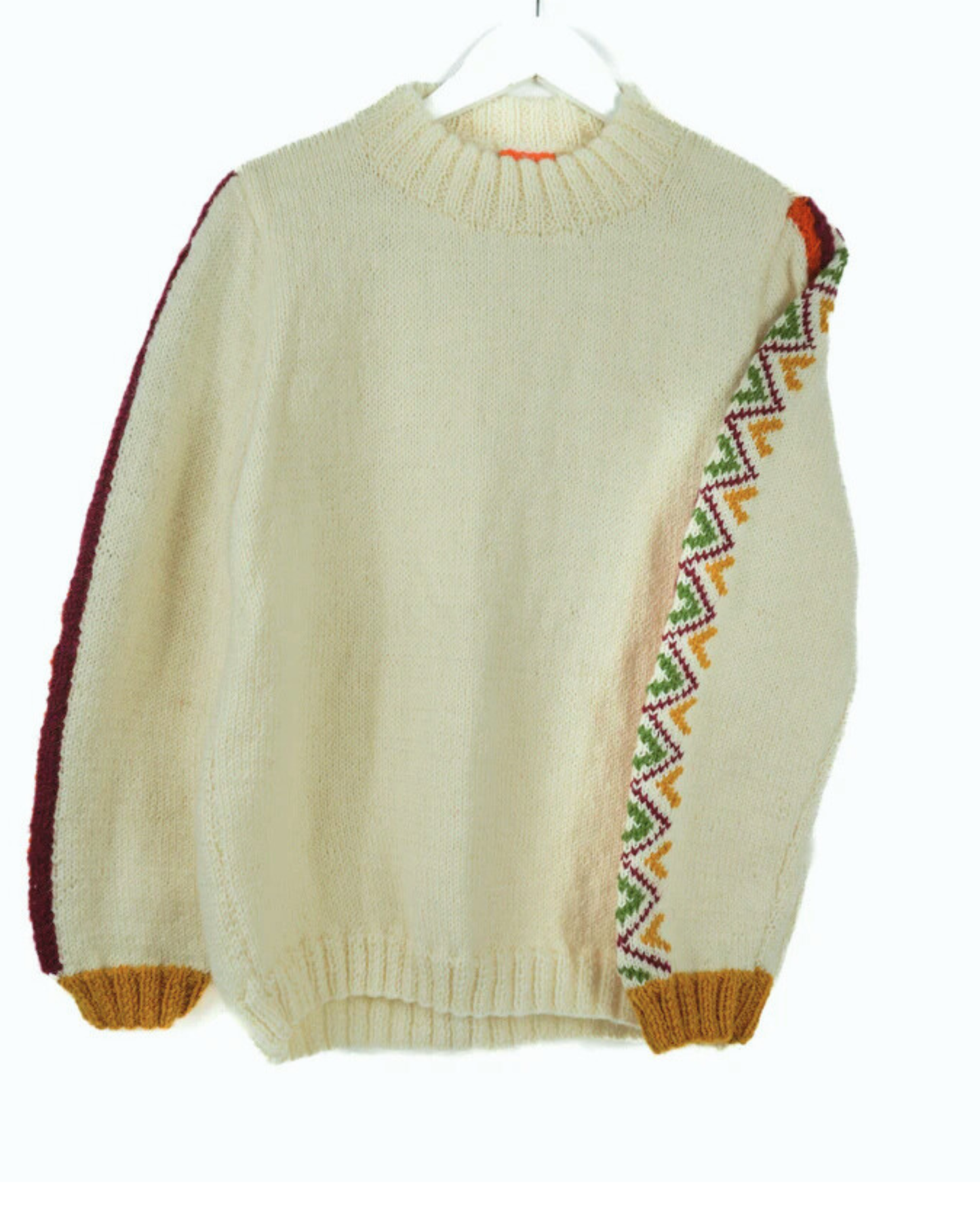 Beige sweater with colorful patterned sleeves on a white background