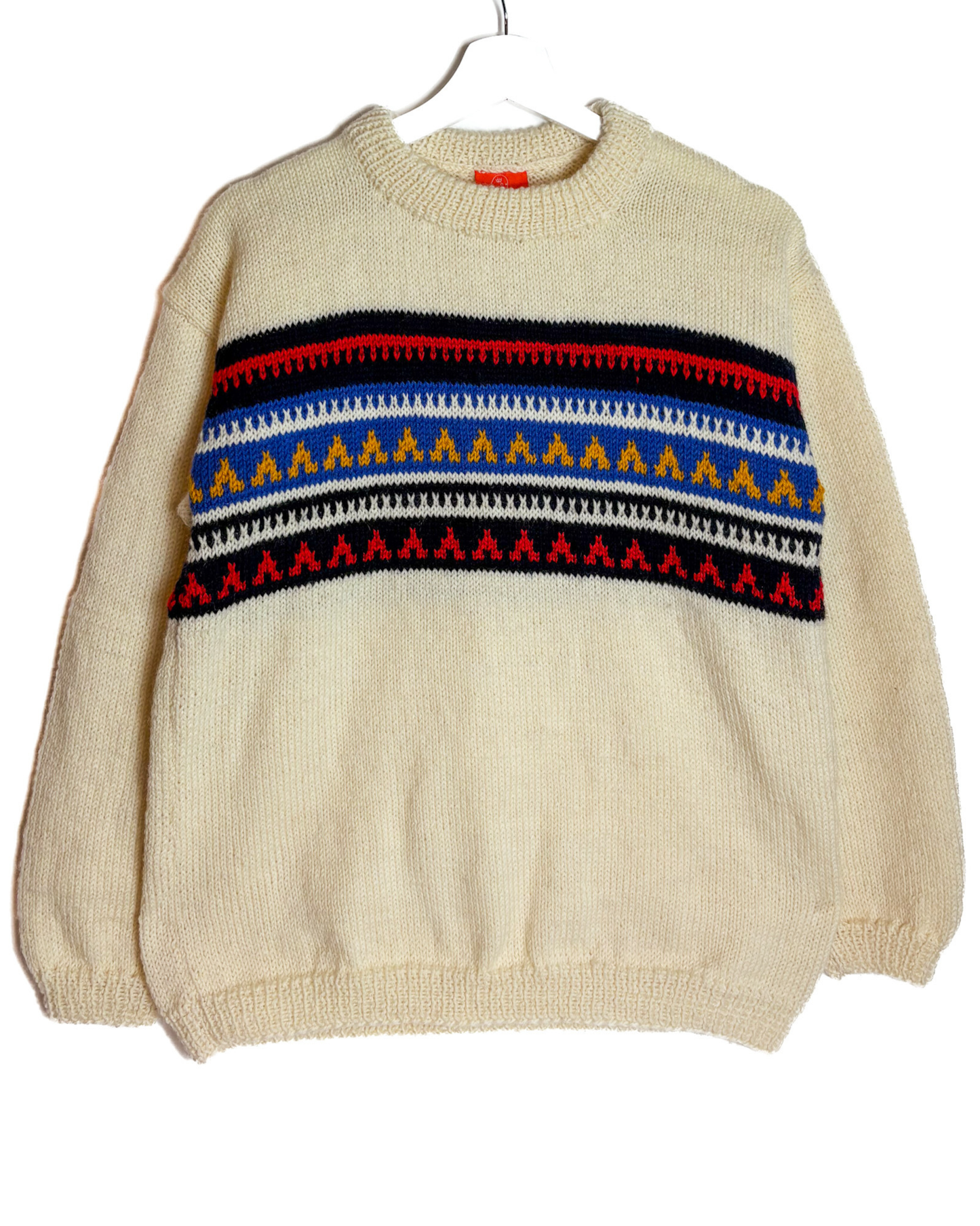 Beige sweater with colorful pattern on a white background