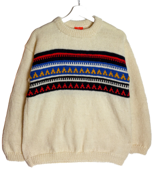 Beige sweater with colorful pattern on a white background
