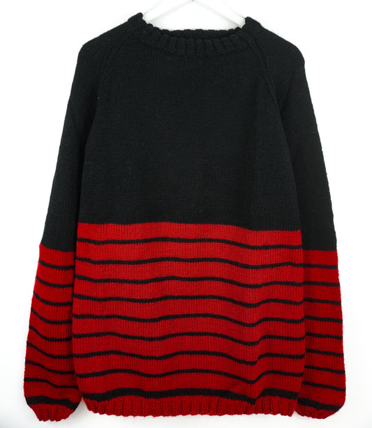 Black and red sweater with horizontal stripes on a white background