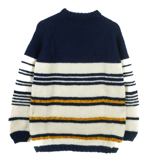 Navy, white, and orange striped sweater on a white background