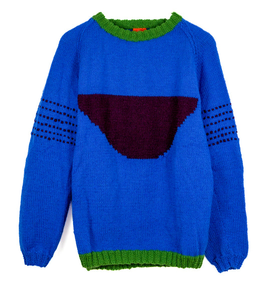 Blue sweater with a red heart design on a white background