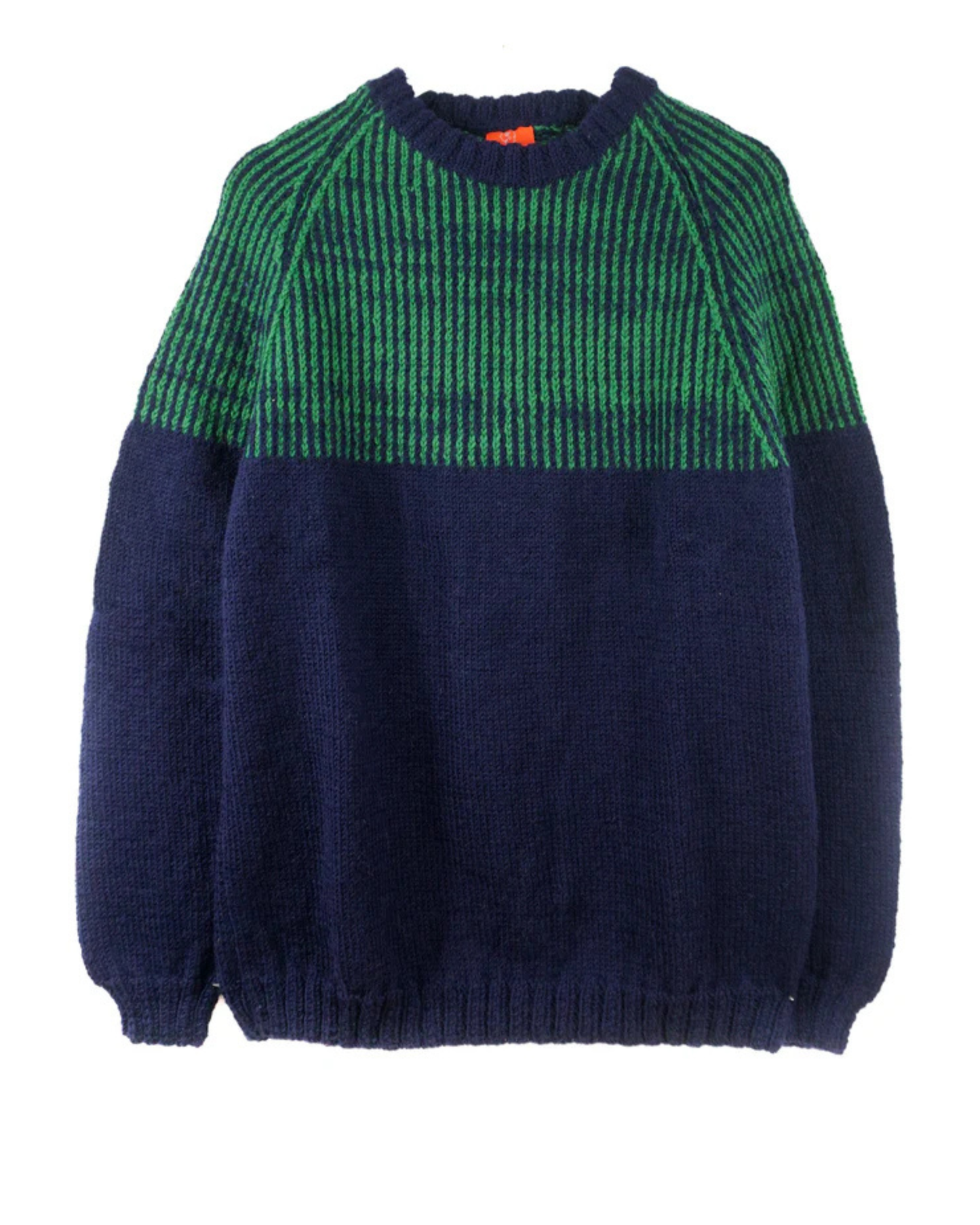 Green and navy jumper on a white background