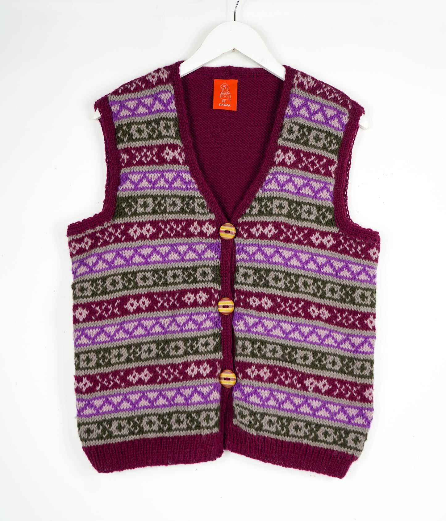 Pure Wool Heritage Vest, with skatedeck upcycled hand made buttons on it. One off, hand knitted vest.