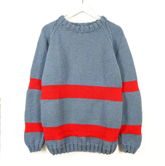 Blue sweater with red stripes on a white background