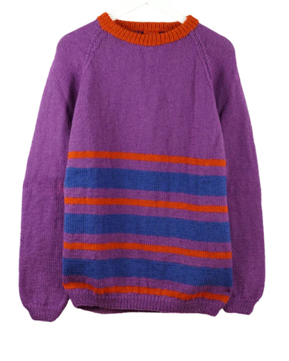 Purple jumper on a white background