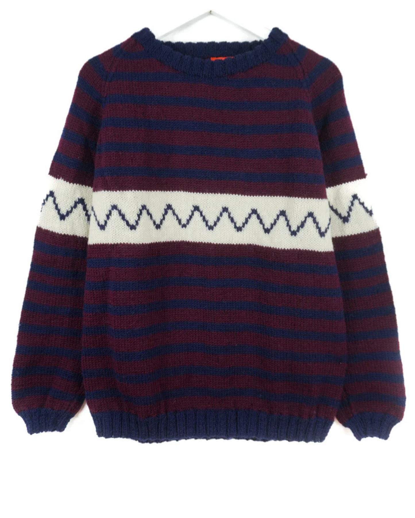 Striped sweater with a zigzag pattern on a white background
