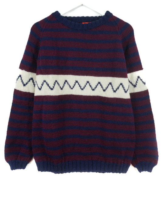 Striped sweater with a zigzag pattern on a white background