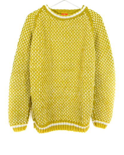 Yellow knitted sweater with white pattern on a white background