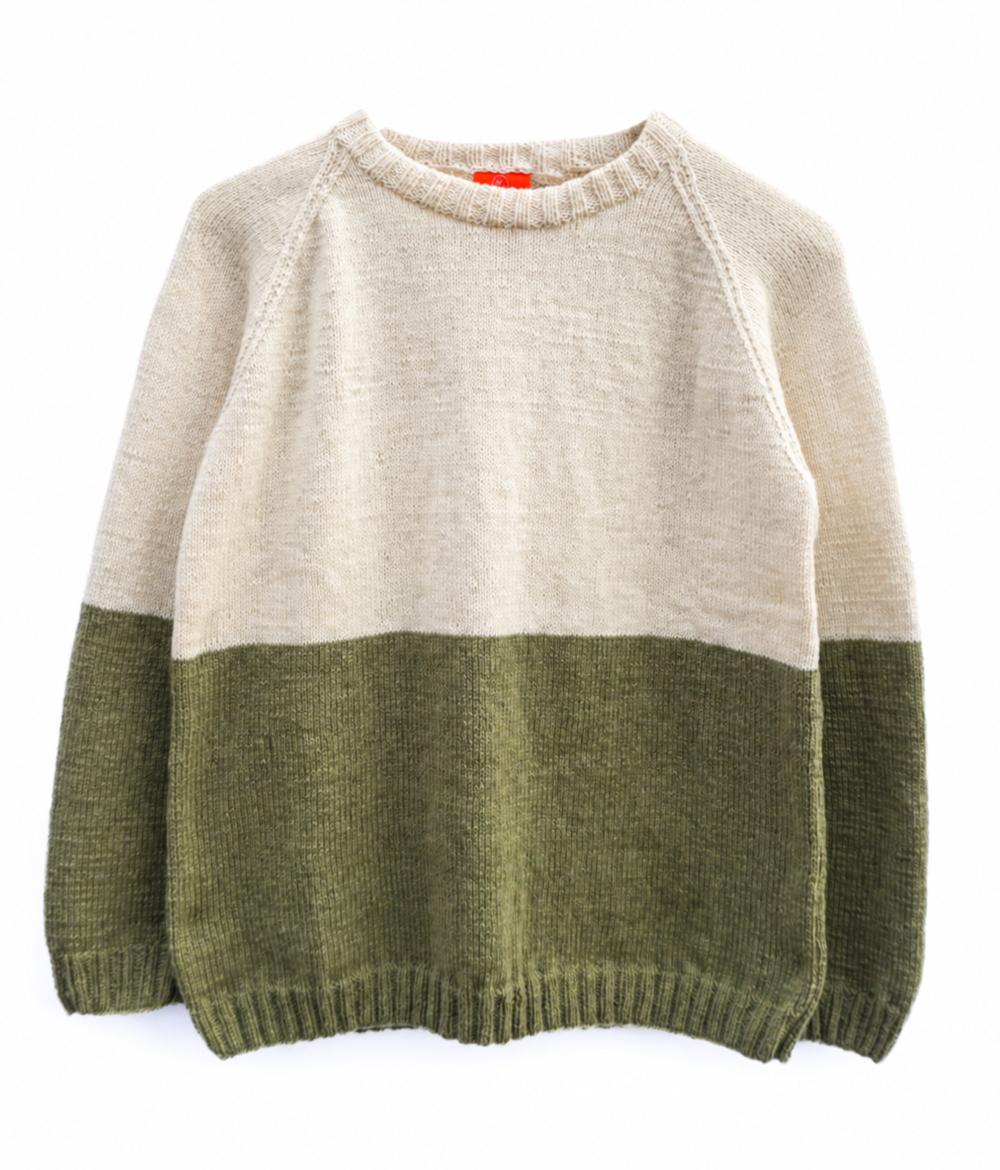 A colorblock knit sweater with a cream upper body and sleeves, and an olive green lower body and sleeves, laid flat against a white background.