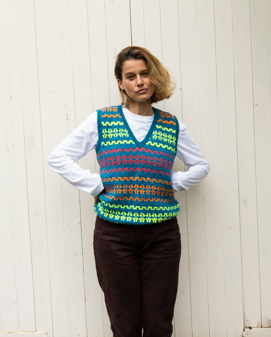 Festival Rows Vest, one-off hand-knitted vest by Kazak Woolies, worn by a model