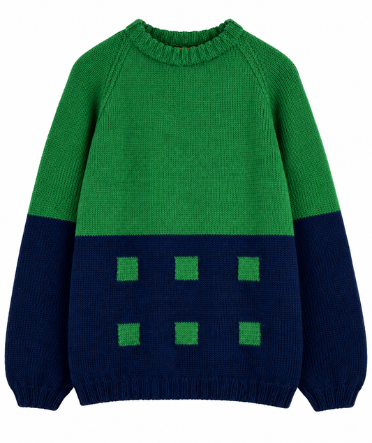 Green and navy hand-knitted crewneck sweater with six green square motifs arranged in two rows across the navy lower section, finished with ribbed neckline, cuffs and hem
