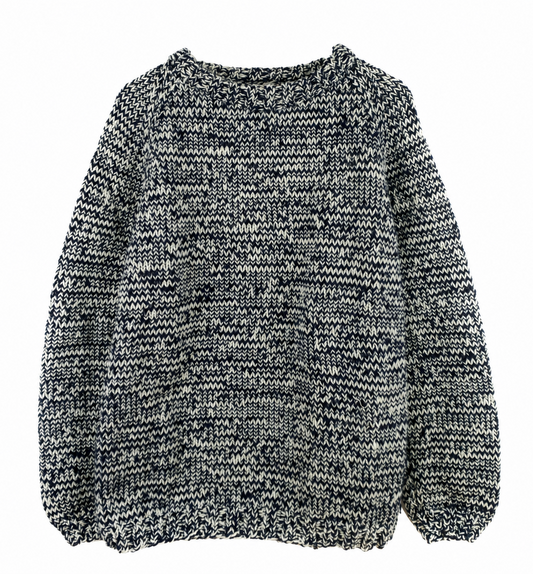 Navy and cream marled hand-knitted crewneck sweater with a chunky textured knit, raglan sleeves and ribbed neckline, cuffs and hem.