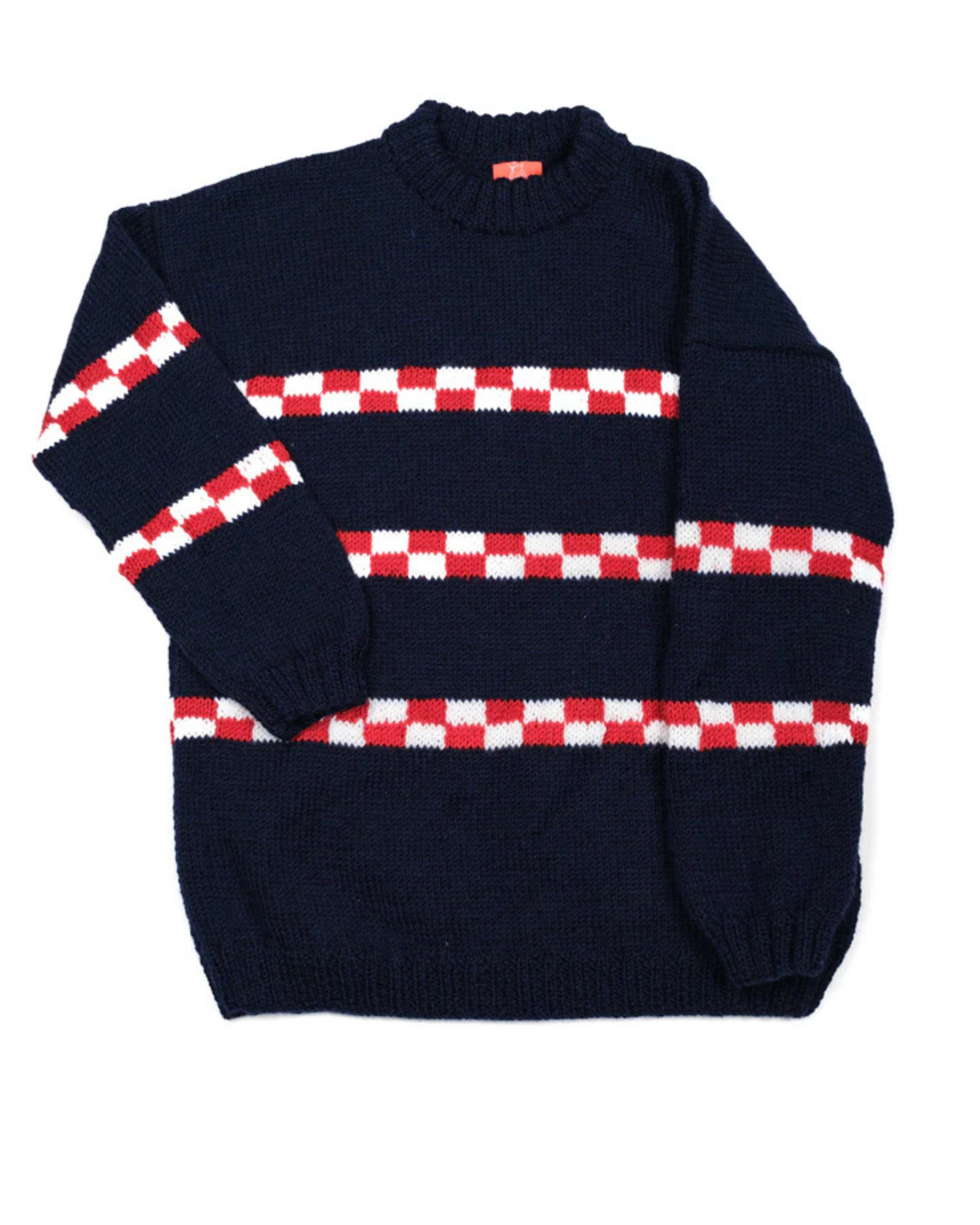 Navy sweater with red and white checkered pattern on a white background