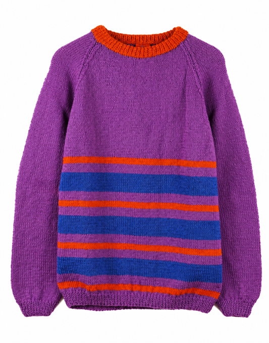 Purple hand-knitted sweater with an orange crew neck and horizontal blue and orange stripes across the lower half, displayed against a white background.